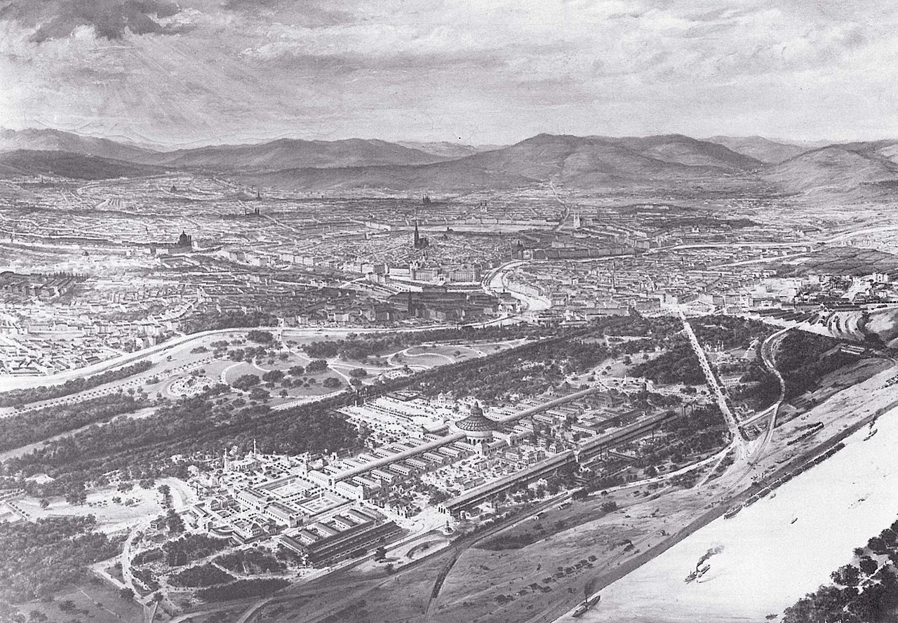 Luftaufnahme des Geländes der Weltausstellung in Wien 1873in der Bildmitte unten deutlich die Rotunde, davon nach links gehend die Kaiserallee, welche sich mit der (von links unten nach rechts oben verlaufenden) Prater Hauptallee kreuzt.Rechts unten die Donau mit der -- von der Donau zum Praterstern verlaufenden -- Ausstellungsstraße.Von allen Gebäuden der Weltausstellung sind heute nur noch zwei erhalten.